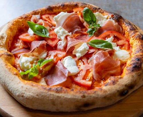 Prosciutto & Burrata Pizza with Fresh Tomatoes & Basil
